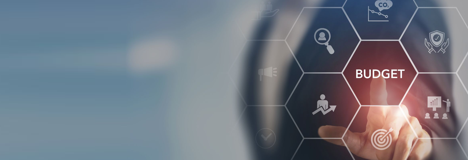 finger touching budget on board