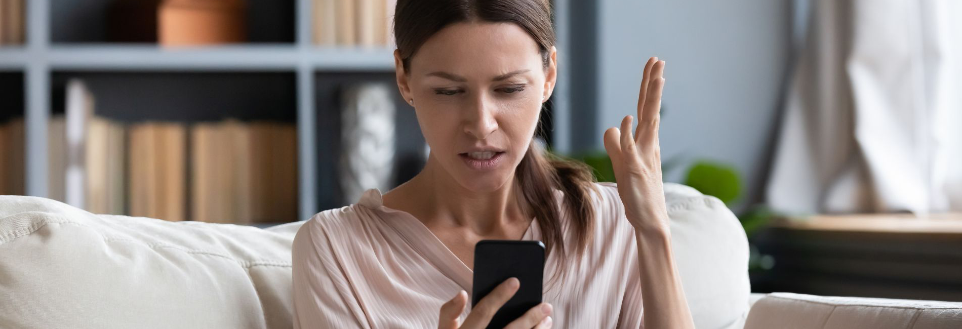 woman frustrated on phone