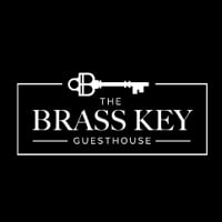 The Brass Key Guesthouse logo