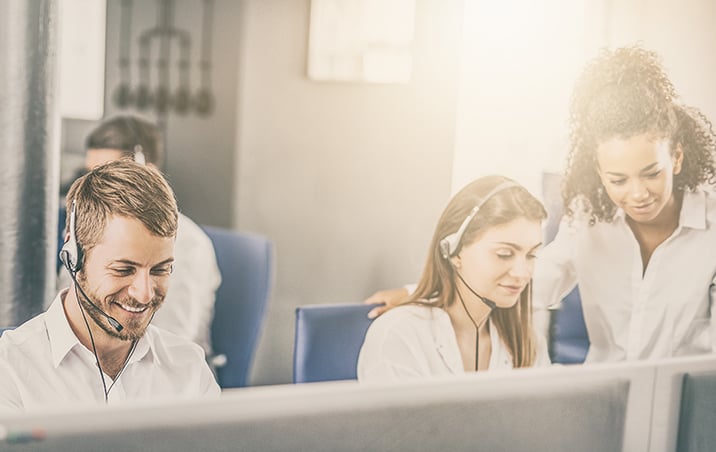 smiling call center employees